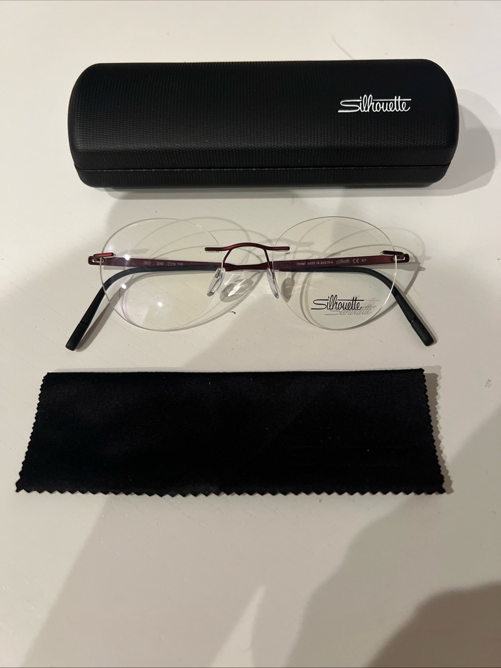 SILHOUETTE RIMLESS EYEGLASSES TITANIUM FRAME 5603 3040 19-150 Red New With Case